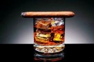 2025855-lit-cigar-descanso-en-vaso-de-whisky-y-cubos-de-hielo-thumb-medium